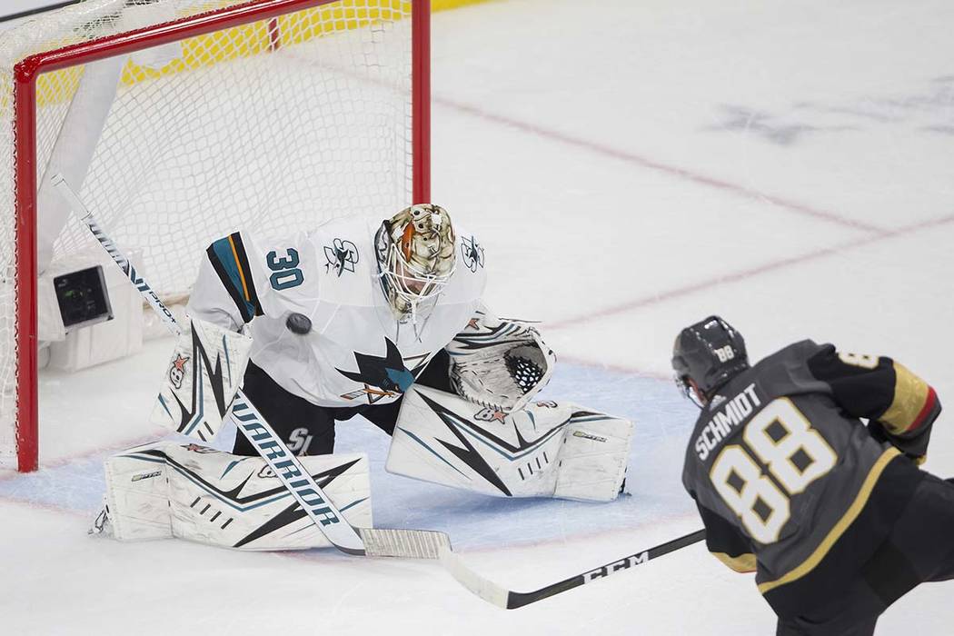 Vegas Golden Knights defenseman Nate Schmidt (88) shoots on San Jose Sharks goaltender Aaron De ...