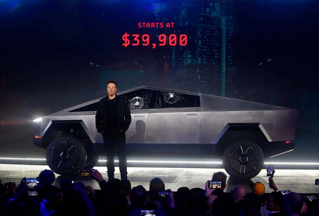 Tesla CEO Elon Musk introduces the Cybertruck at Tesla's design studio Thursday, Nov. 21, 2019, ...