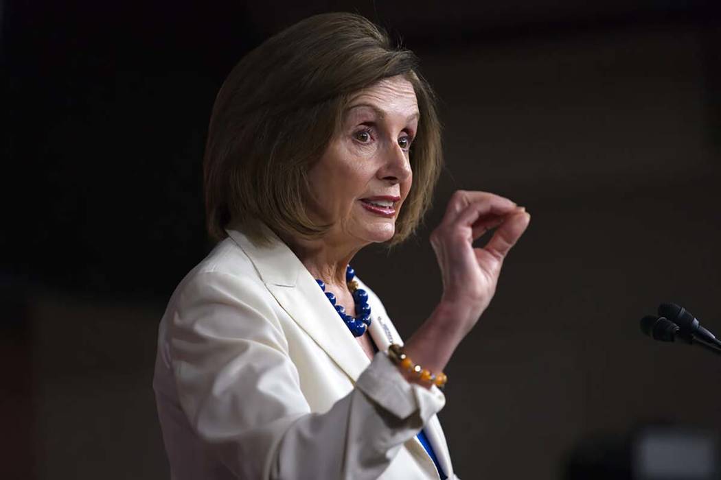 Speaker of the House Nancy Pelosi, D-Calif., talks to reporters as the House Intelligence Commi ...