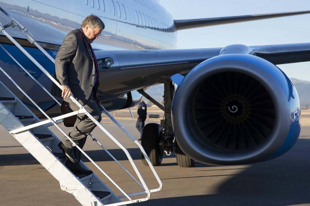Attorney General William Barr steps off an aircraft at Glacier Park International Airport, Thur ...