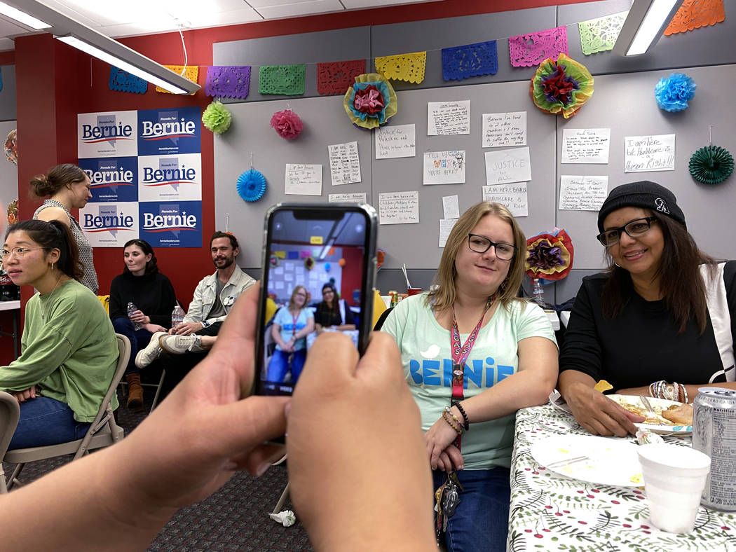 Field organizers Amber Giroux, left, and Issis Juliao, both of Las Vegas, at a Thanksgiving din ...