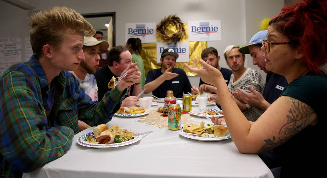 Campaign workers, from left, and Hudson Villeneuve of Ypsilanti, Mich. Jesse Archer of Niles, ...