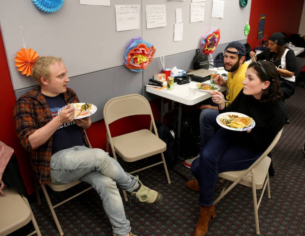 Campaign workers, from left, Data Analyst Spencer Toth of Minneapolis, Data Director Zach Asman ...