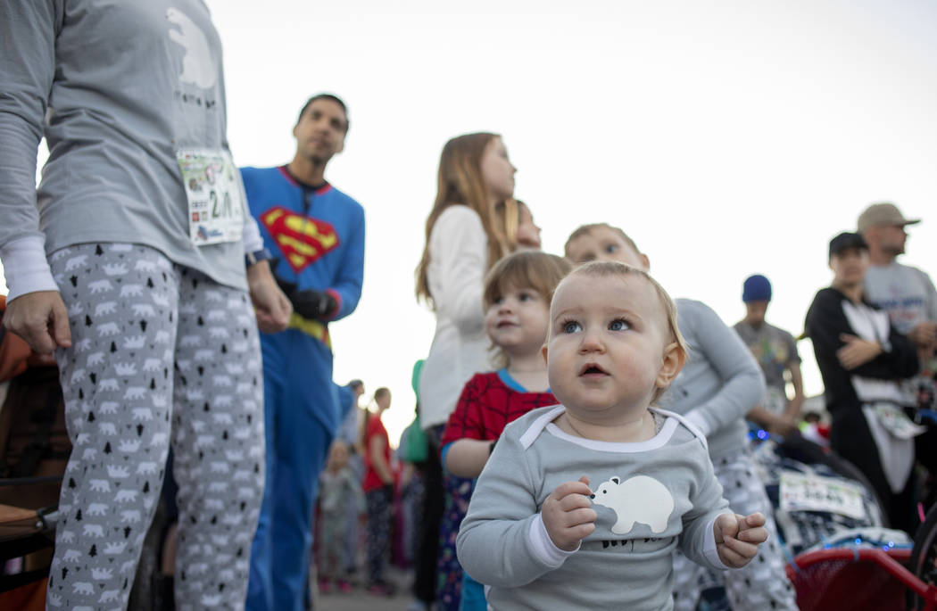 Presley Tisdale, 1, gets ready to race in the PJ 5K & 1-Mile Walk on Sunday, Nov. 24, 2019, ...