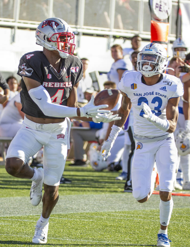 UNLV Rebels wide receiver Randal Grimes (4) hauls in a bobbled pass for a touchdown over San Jo ...