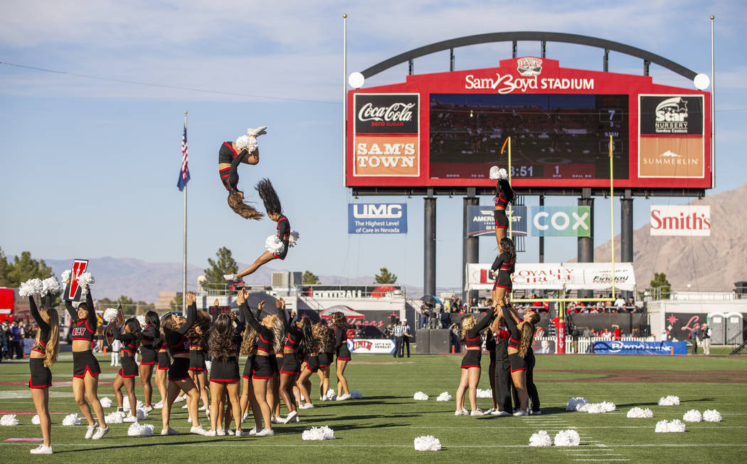 The UNLV cheerleaders perform for the crowd while the team battles the San Jose State Spartans ...