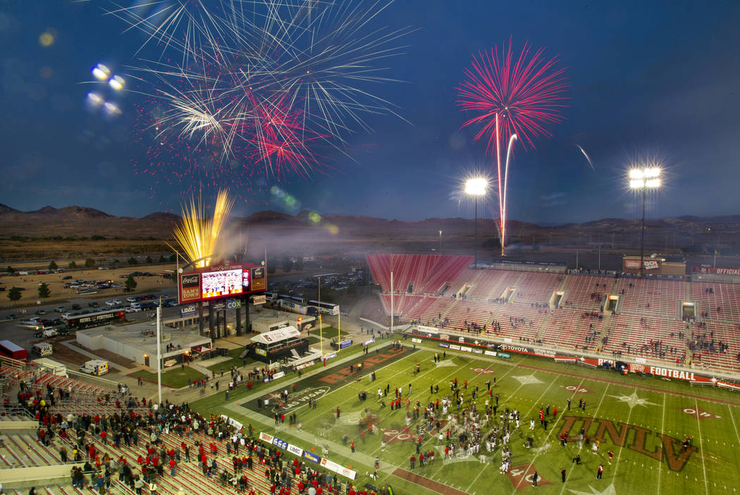 Fireworks erupt above Sam Boyd Stadium following the final game there as the UNLV Rebels defeat ...