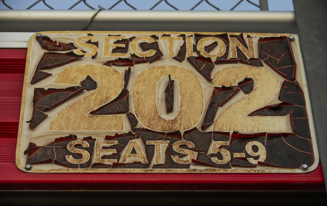 Paint peels on a sign at Sam Boyd Stadium as the UNLV Rebels continue to battle with the San J ...