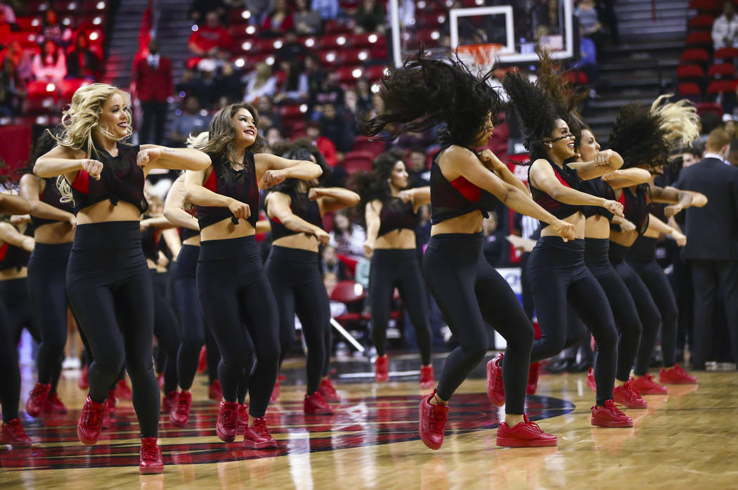The Rebel Girls perform during the first half of a basketball game at the Thomas & Mack Center ...