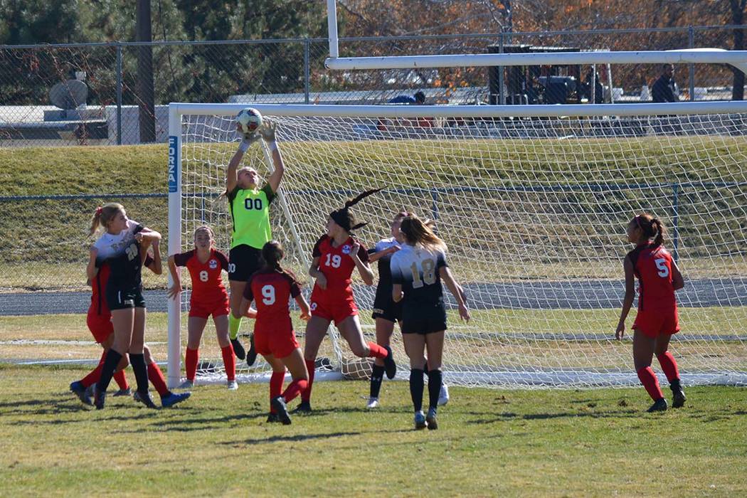 The Faith Lutheran girls soccer team attacks the Coronado goal during a 1-0 win in the Class 4A ...