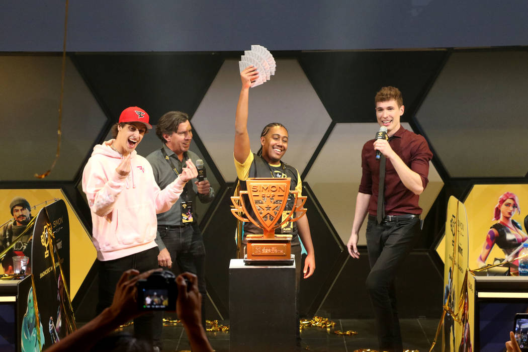 Daryl John, known online as Bugzvii, celebrates after winning the Simon Cup at the HyperX Espor ...