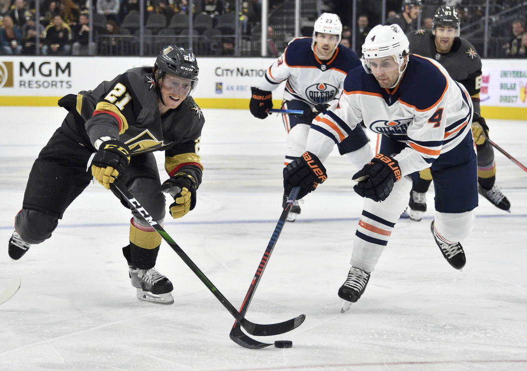 Vegas Golden Knights goaltender Marc-Andre Fleury (29) and defenseman Brayden McNabb (3) defend ...