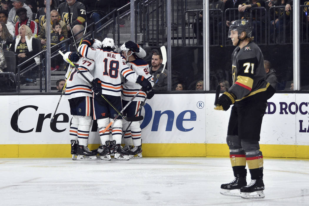 Edmonton Oilers defenseman Oscar Klefbom (77), left wing James Neal (18) and center Gaetan Haas ...