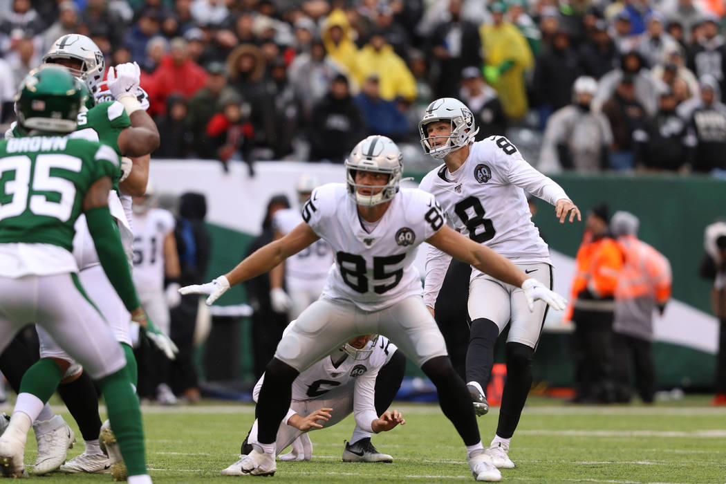 Oakland Raiders kicker Daniel Carlson (8) watches after kicking a field goal attempt as Oakland ...