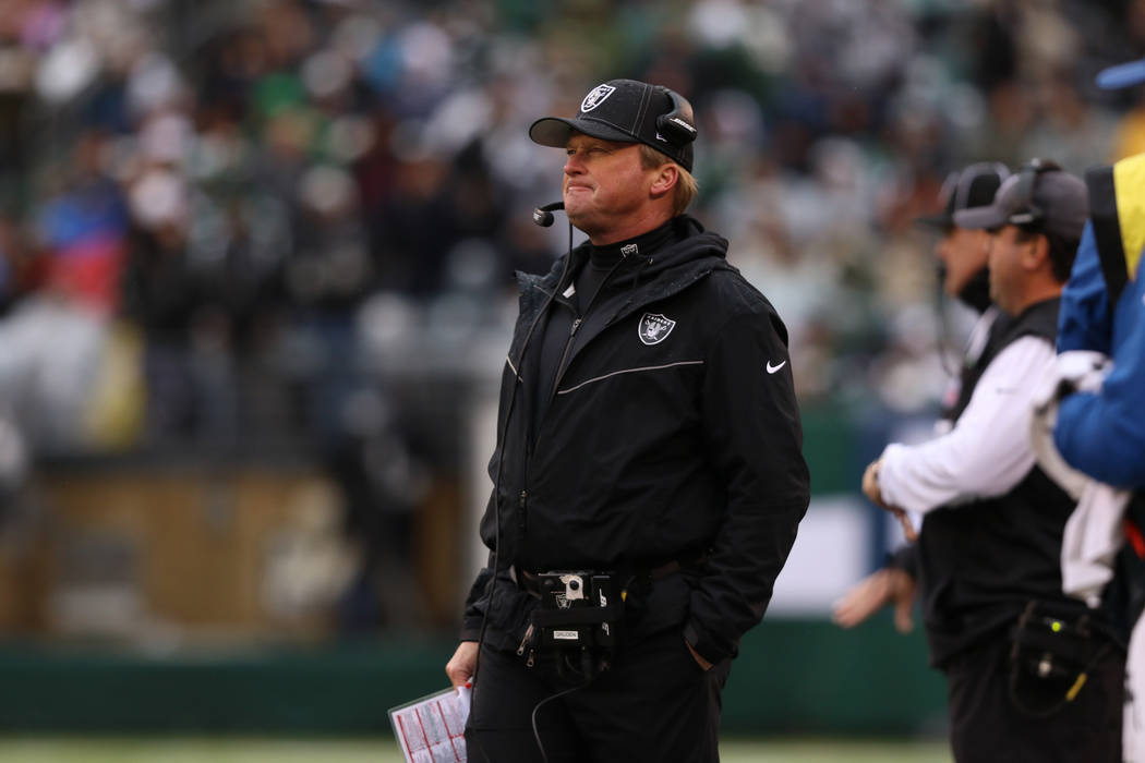 Oakland Raiders head coach Jon Gruden looks on from the sideline during the first half of an NF ...