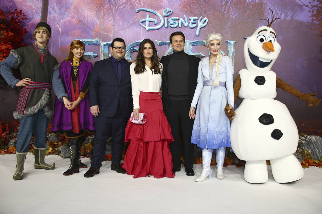 Character actors Voice actors from left to right, Kristoff, Anna, Elsa (2nd from right) and Ola ...