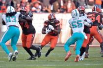 Cleveland Browns running back Nick Chubb (24) rushes during the second half of an NFL football ...