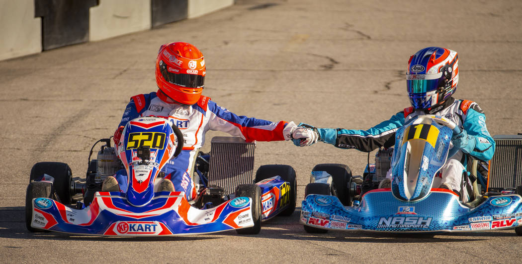 X30 Master driver Kip Foster, left, is congratulated on his win by fellow driver Matt Johnson f ...