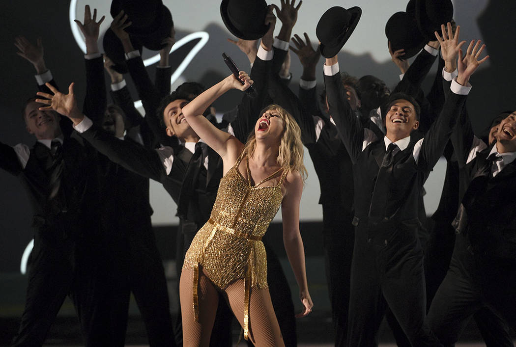 Taylor Swift, winner of the artist of the decade award, performs a medley at the American Music ...