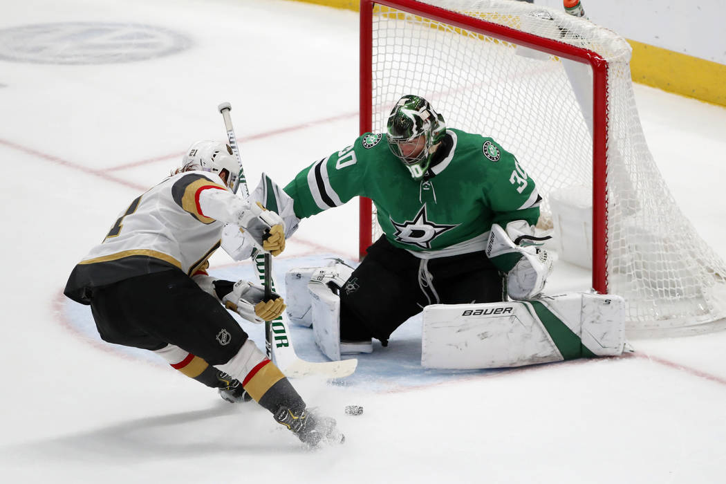 Dallas Stars goaltender Ben Bishop (30) makes a save against a shot from Vegas Golden Knights c ...