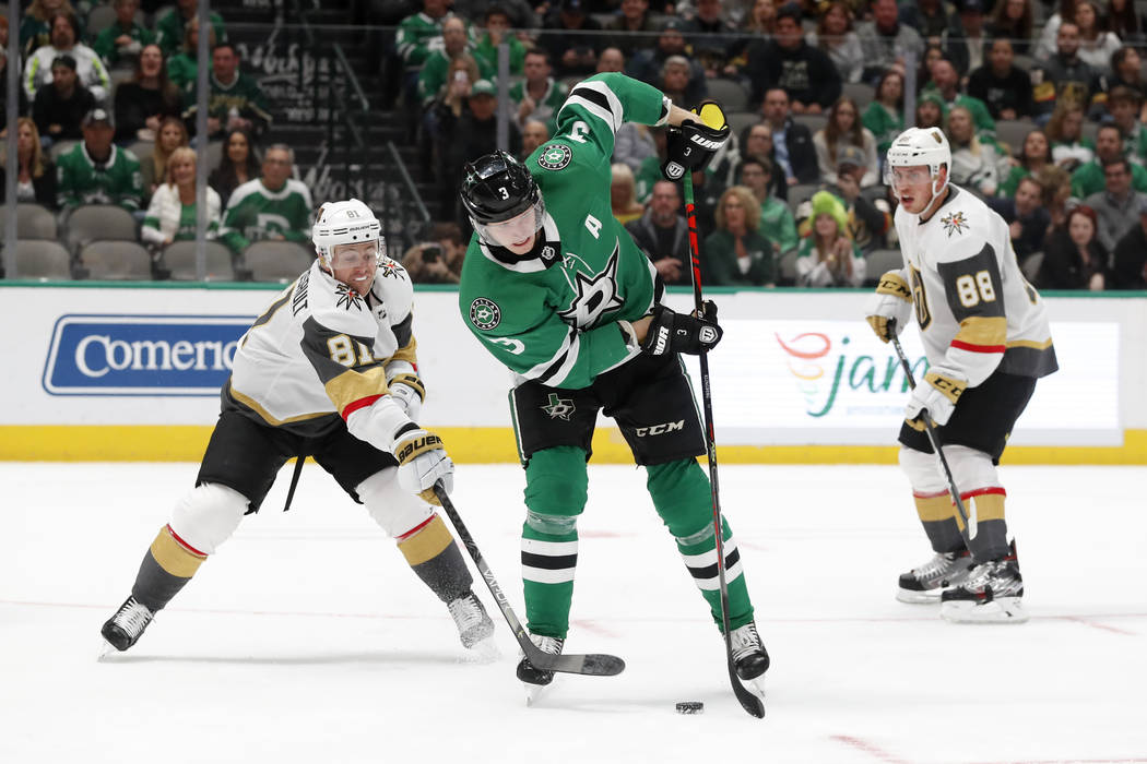 Dallas Stars defenseman John Klingberg (3) handles the puck as Vegas Golden Knights' Jonathan M ...