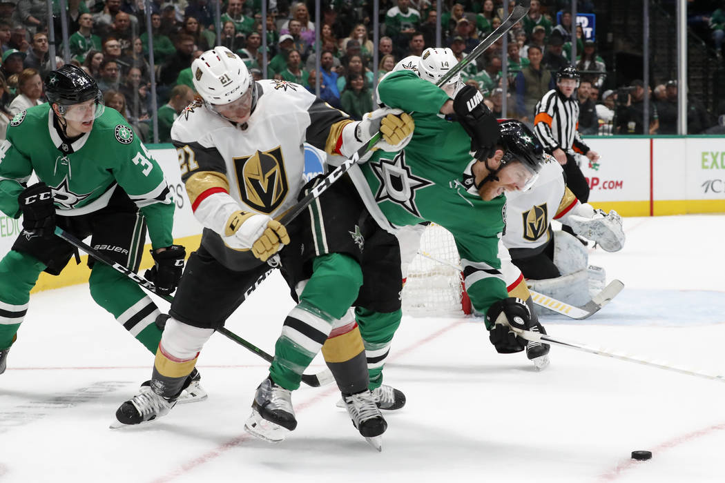 Dallas Stars center Joe Pavelski (16) and Vegas Golden Knights center Cody Eakin, center left, ...