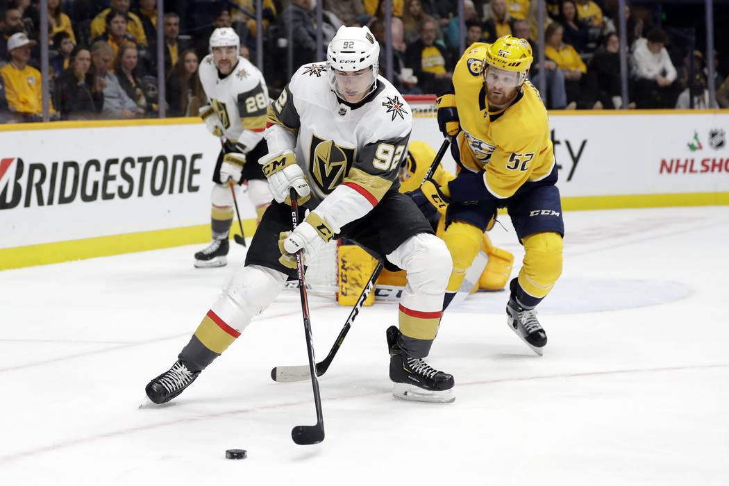 Vegas Golden Knights left wing Tomas Nosek (92), of the Czech Republic, moves the puck in front ...