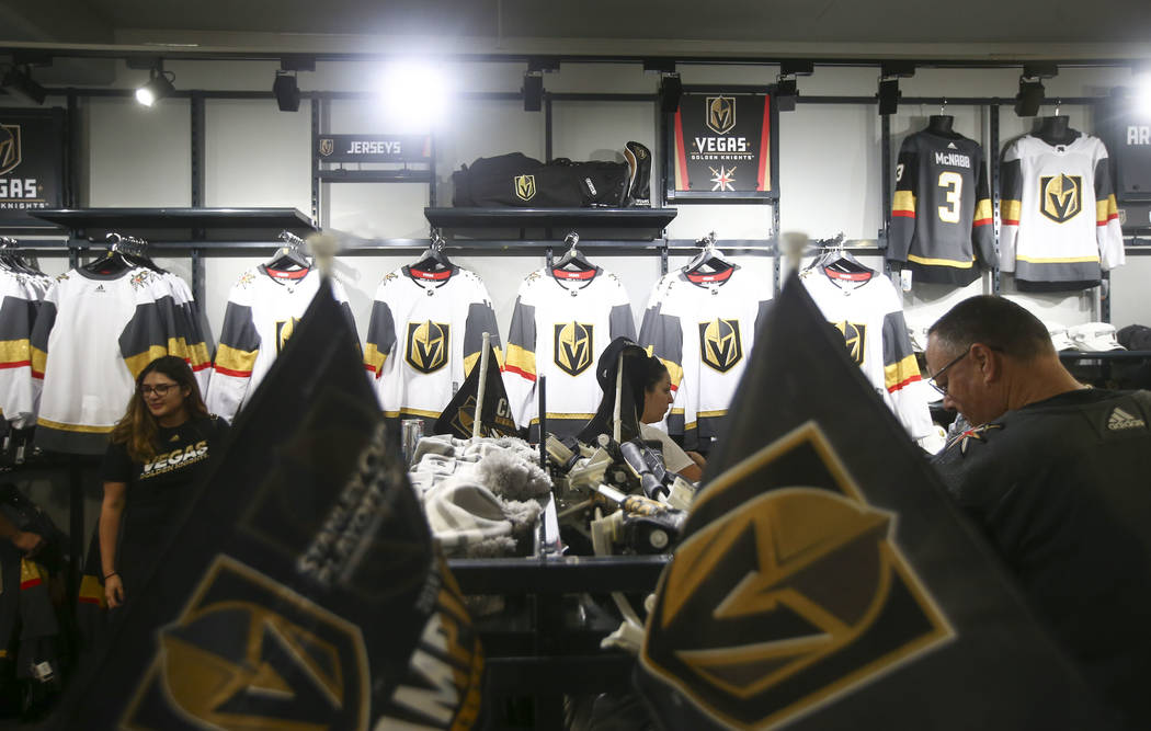 Golden Knights fans browse through merchandise at The Arsenal following a team practice at City ...