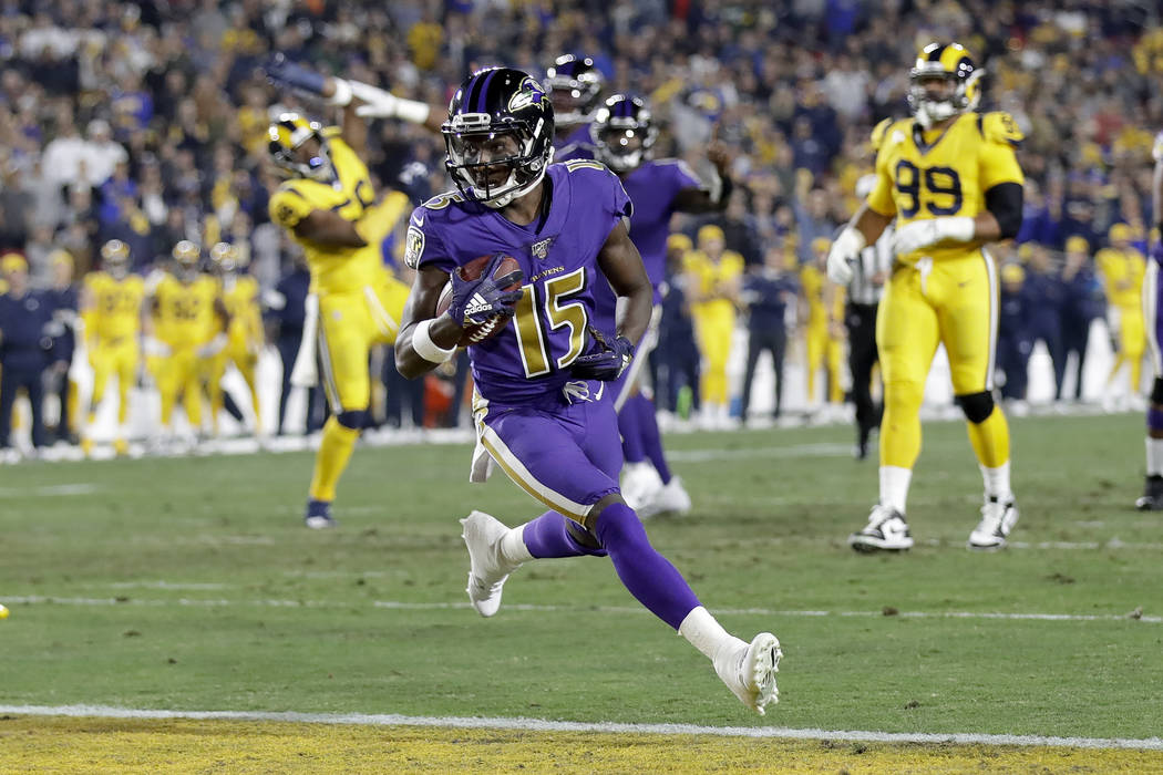 Baltimore Ravens wide receiver Marquise Brown scores against the Los Angeles Rams during the fi ...