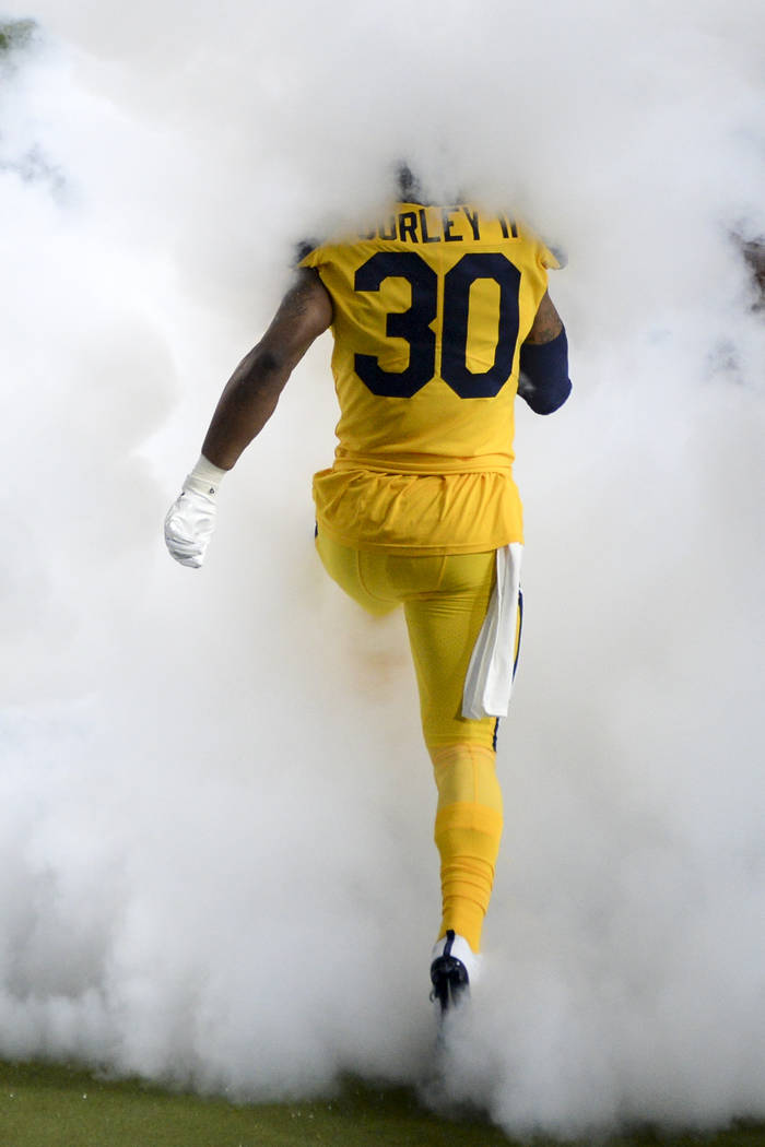 Los Angeles Rams running back Todd Gurley runs on to the field for an NFL football game against ...