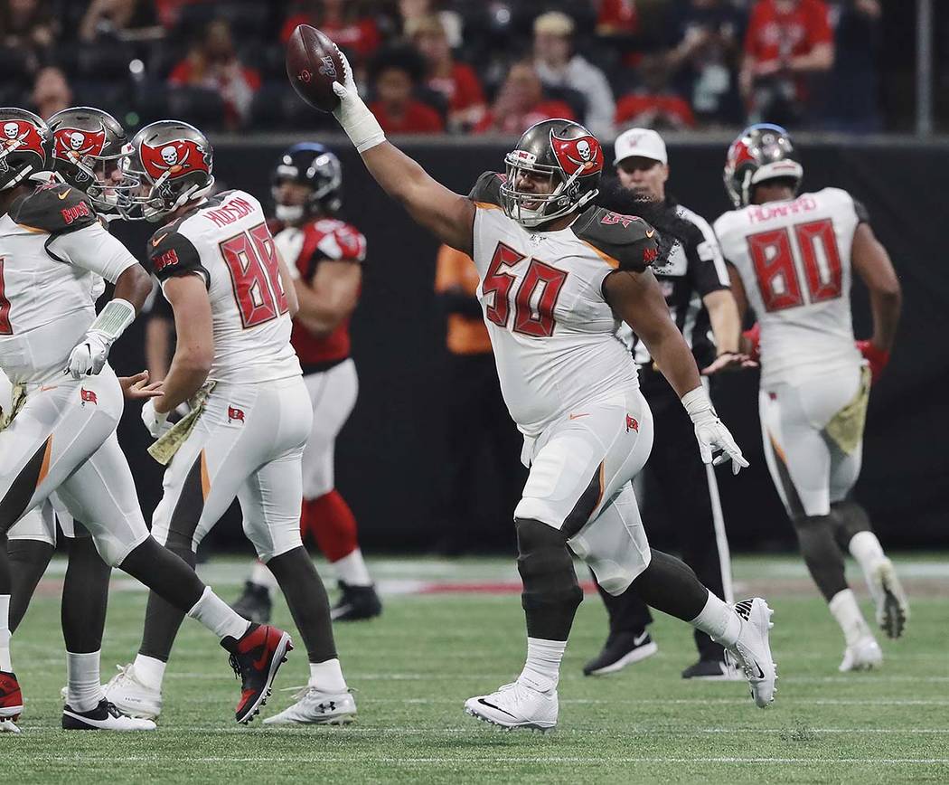 Tampa Bay Buccaneers defensive lineman Vita Vea (50)celebrates his touchdown catch during the s ...