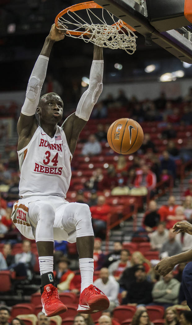 UNLV Rebels forward Cheikh Mbacke Diong (34) dunks in the second half during their NCAA basketb ...