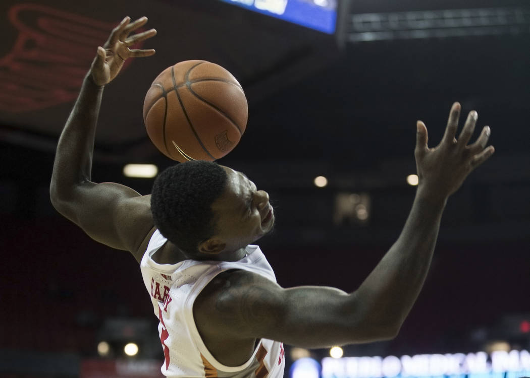 UNLV Rebels guard Amauri Hardy (3) takes a hard foul in the second half during their NCAA baske ...