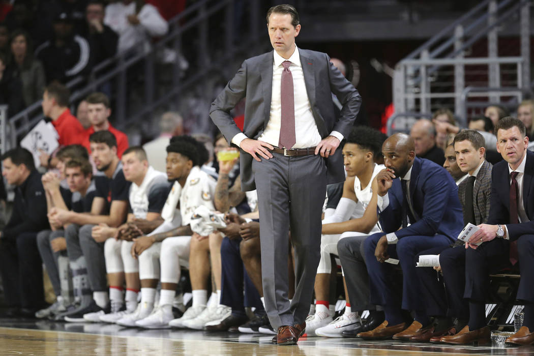 Cincinnati coach John Brannen paces the sideline during the first half against UNLV in an NCAA ...