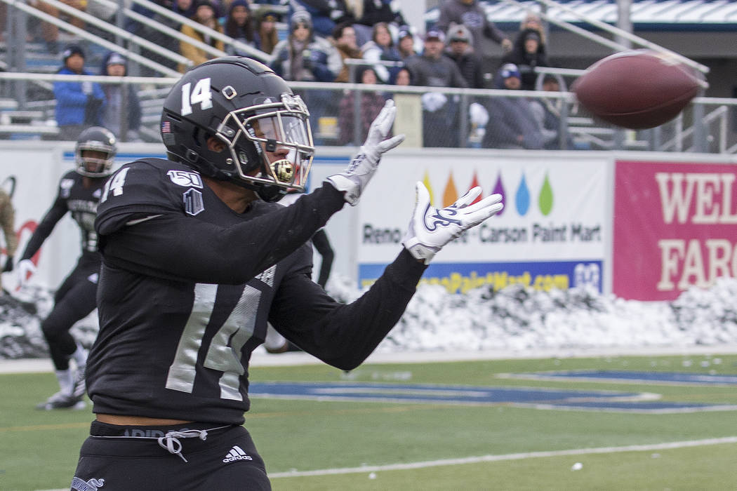 Nevada wide receiver Dominic Christian (14) makes the catch against UNLV second half of an NCAA ...