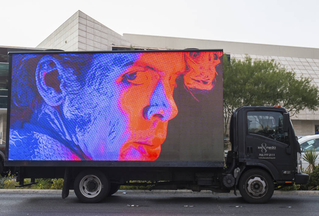 A mobile billboard truck drives on the Strip at on Saturday, Nov. 30, 2019, in Las Vegas. (Benj ...