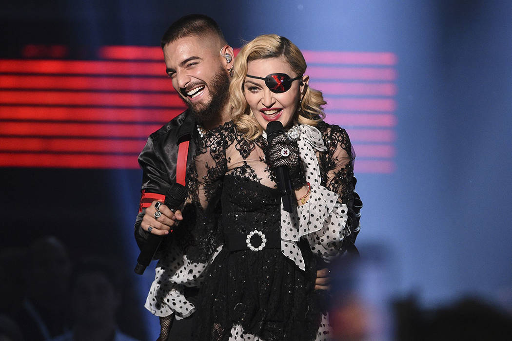 Maluma, left, and Madonna perform "Medellin" at the Billboard Music Awards on Wednesd ...