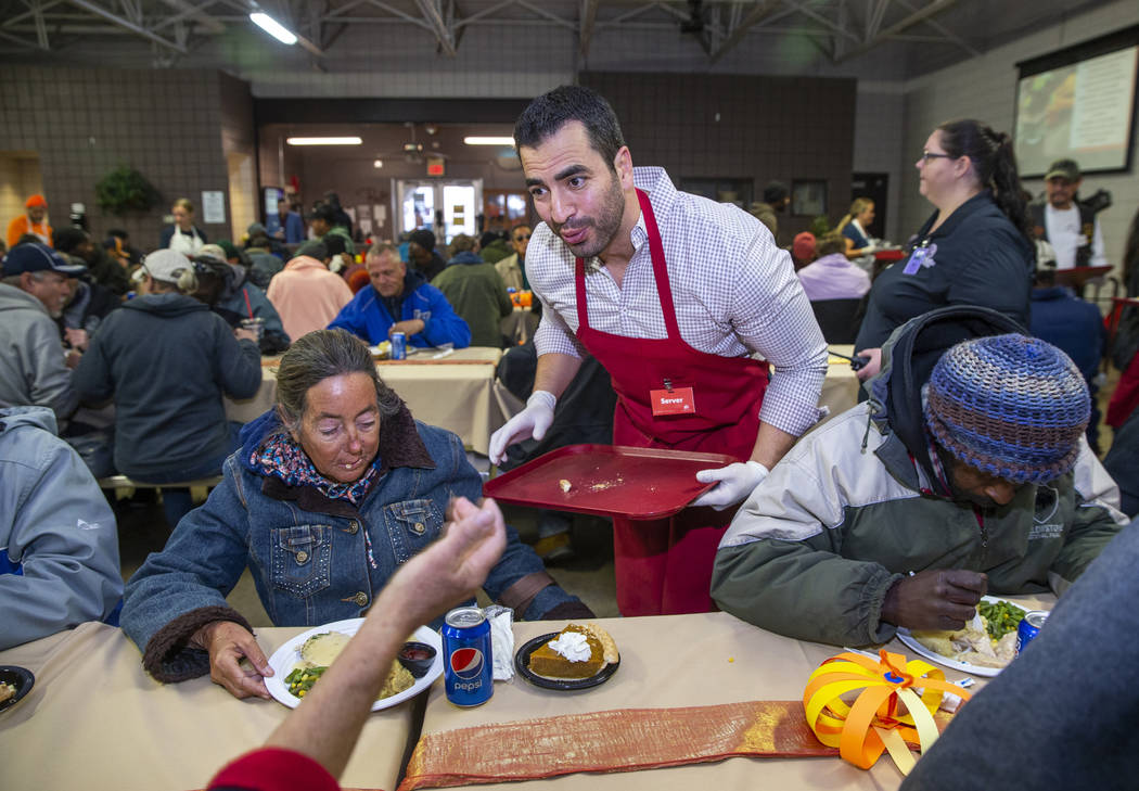 Former U.S. Rep. Ruben Kihuen, D-Nev., delivers another meal as Catholic Charities of Southern ...