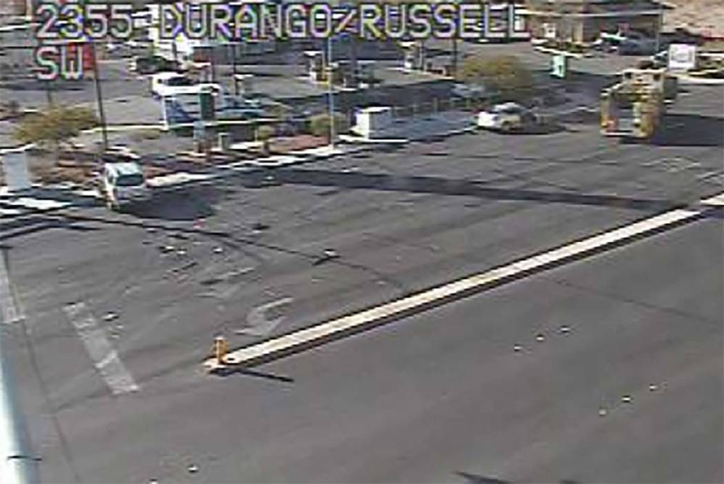 Las Vegas police investigate a fatal crash at South Durango Drive and West Russell Road in the ...