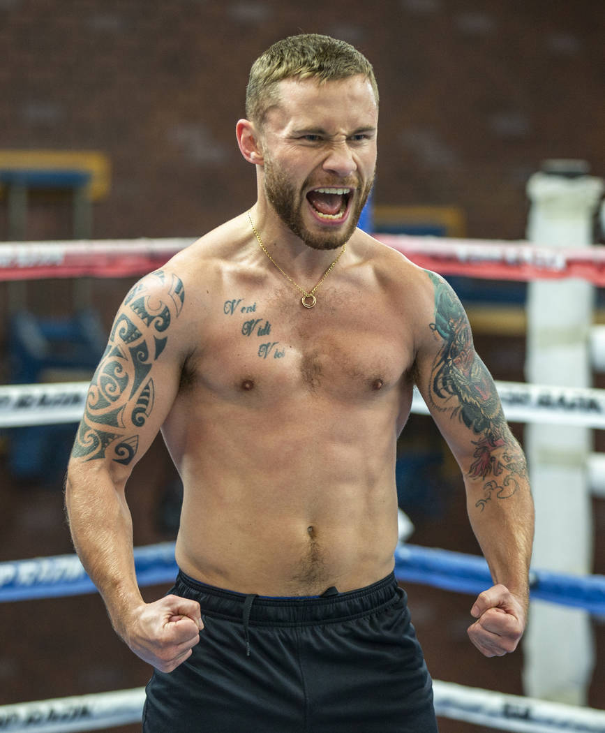 Former two-weight world boxing champion Carl Frampton is pumped up during a training at the Top ...
