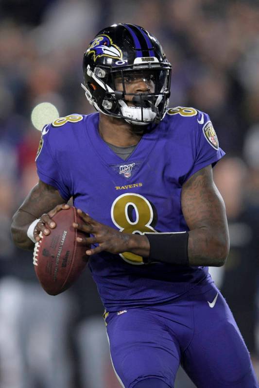 Baltimore Ravens quarterback Lamar Jackson in an NFL football game against the Los Angeles Rams ...