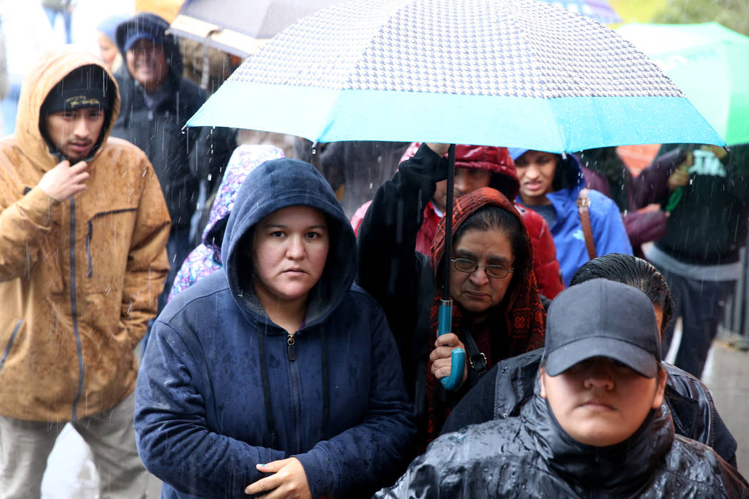 People line up to enter JCPenney at Meadows Mall in Las Vegas for early Black Friday deals on T ...