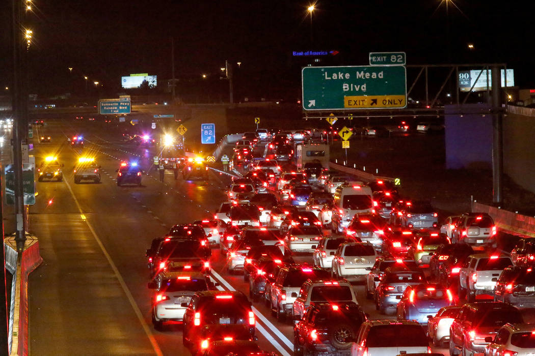Traffic backs up after a fatal crash on U.S. Highway 95 near Lake Mead Boulevard, Thursday, Nov ...