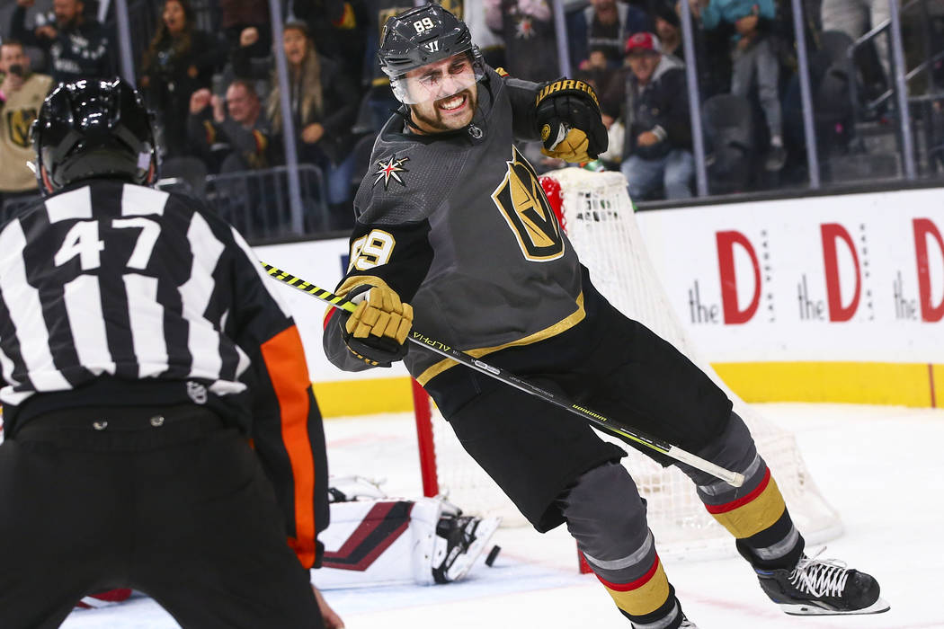 Golden Knights' Alex Tuch (89) celebrates after scoring in a shootout to win the game against t ...