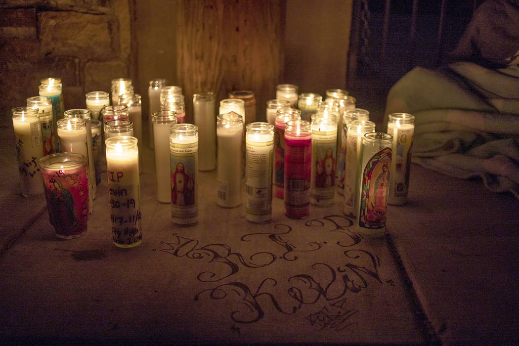 People gather to mourn a 17-year-old boy who was shot and killed this morning near the 2600 blo ...