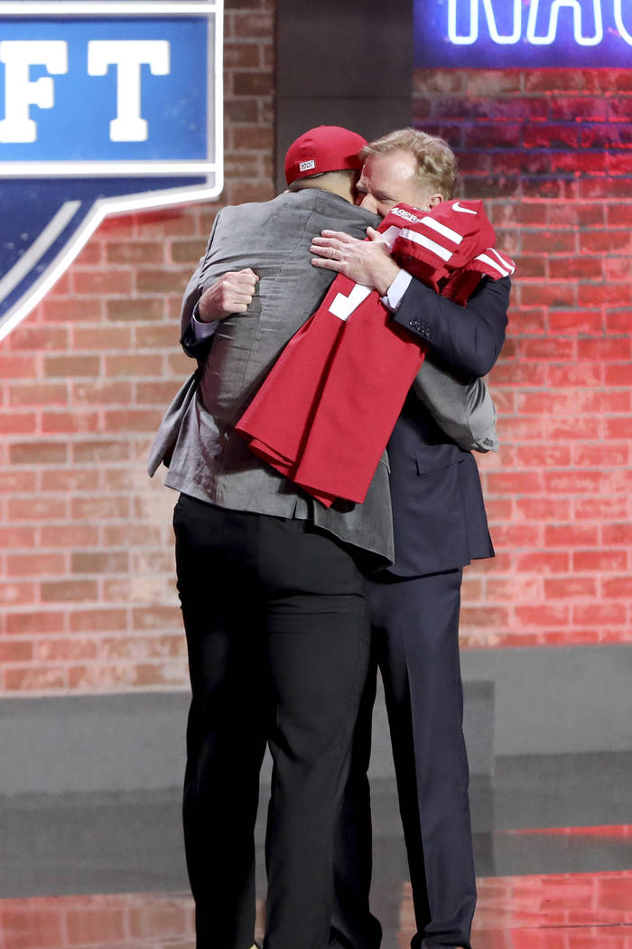 Commissioner Roger Goodell hugs Nick Bosa after Bosa was selected by the San Francisco 49ers wi ...