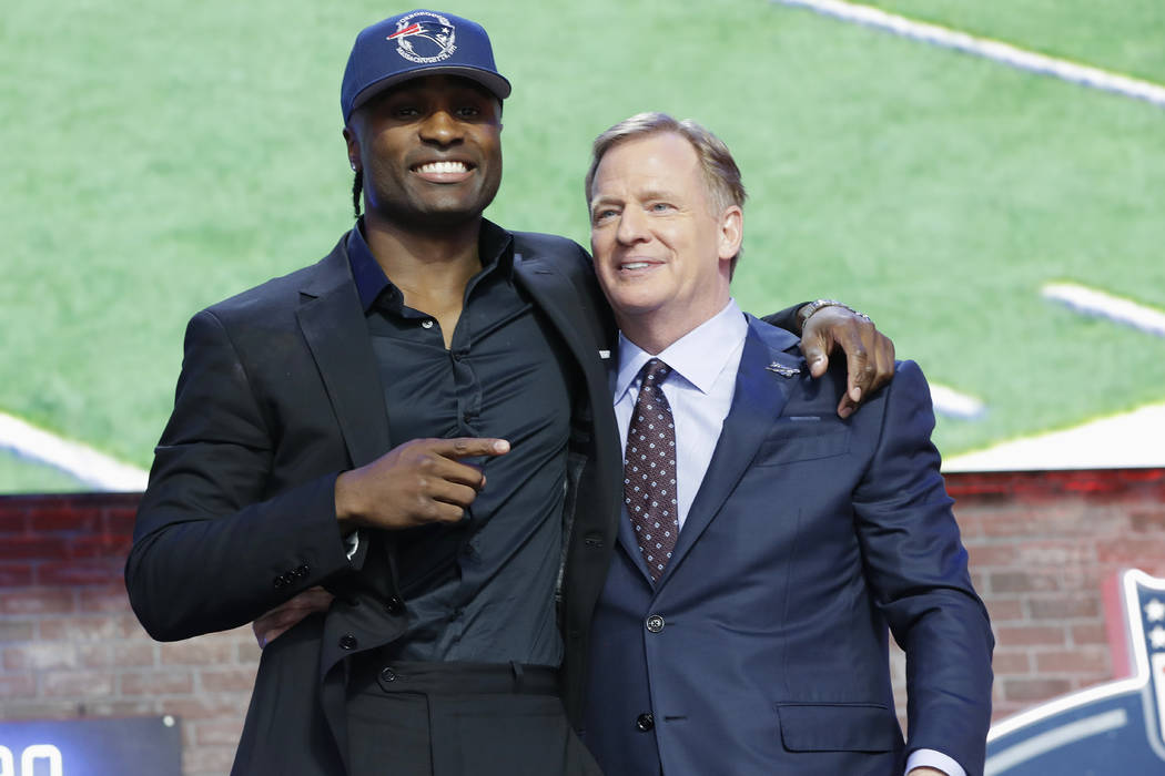 Vanderbilt cornerback Joejuan Williams poses with NFL Commissioner Roger Goodell after the New ...