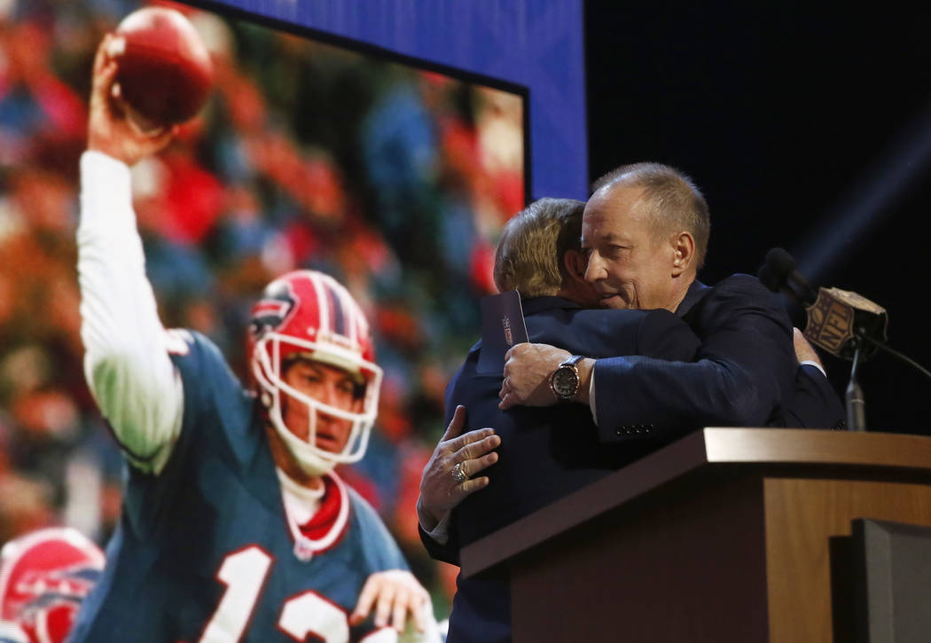 NFL Hall of Famer and Buffalo Bill Quarterback Jim Kelly hugs NFL commissioner Roger Goodell be ...