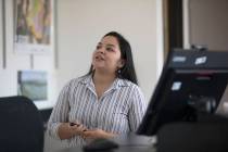 Giavanna Fernandez delivers a presentation in an environmental management class at the College ...