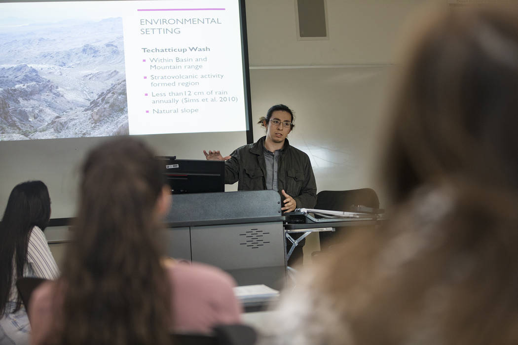 Juan Garcia-Hernandez delivers a presentation in an environmental management class at the Colle ...